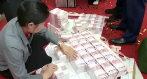 26 millions de dollars en liquide distribués à 7 000 employés chinois