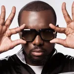 Photo : Gims en examen : caution 1,5 M€, libre sous contrôle